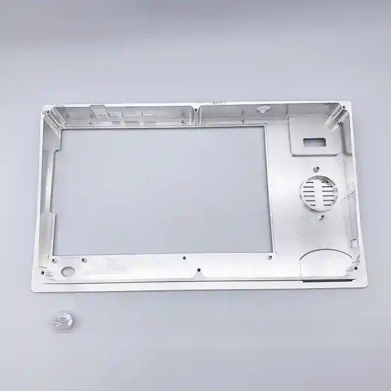 Machined housing with a large cavity, mounting holes, and internal features