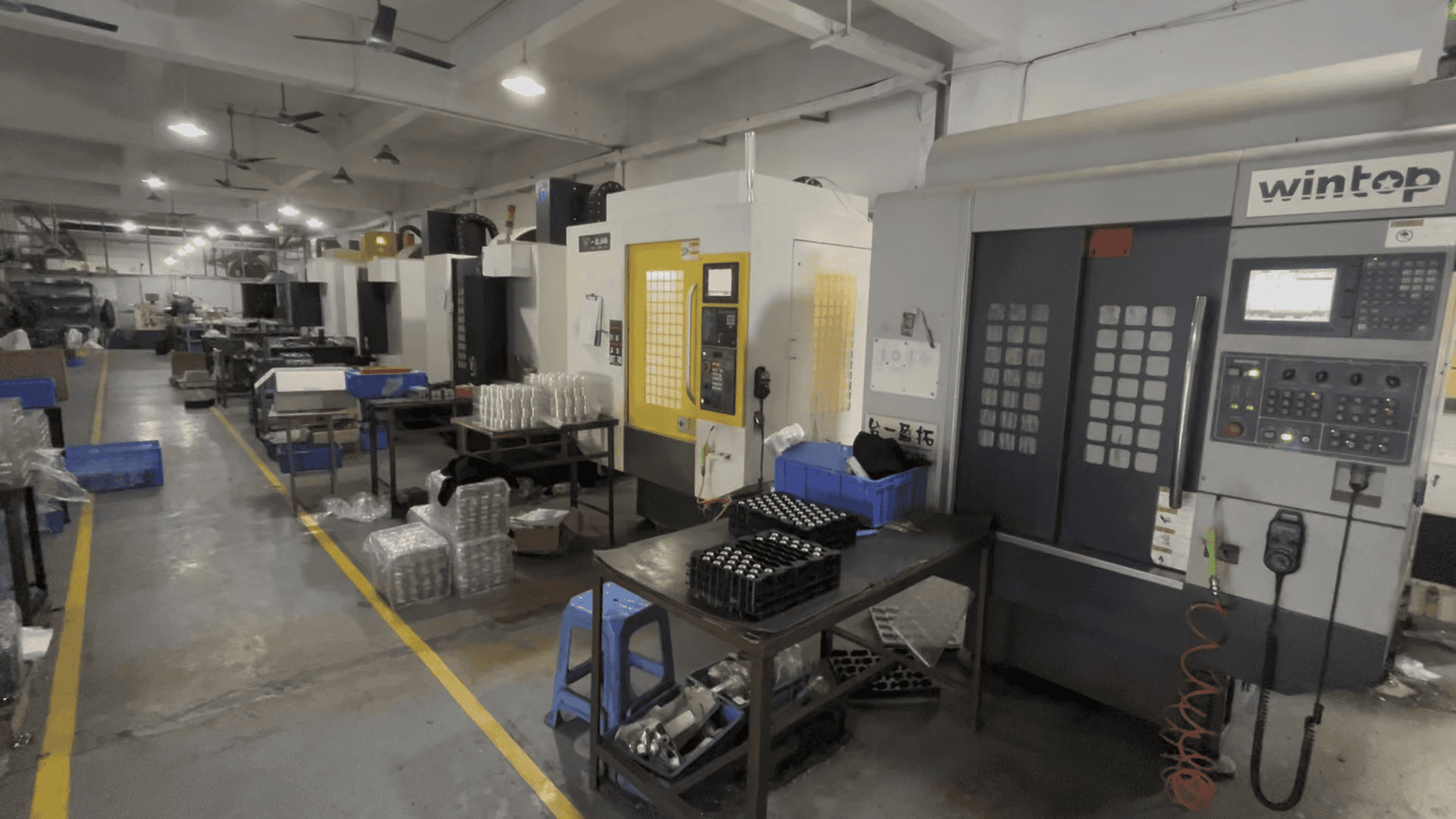 High-precision CNC machining equipment in a manufacturing workshop for custom parts.