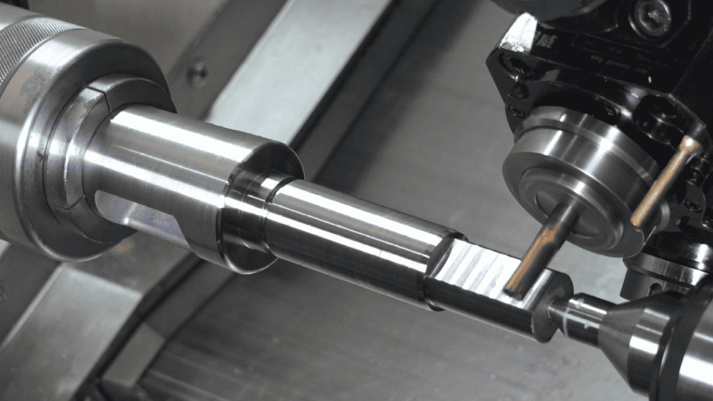 High-precision CNC machining process with metal workpiece on industrial lathe machine.