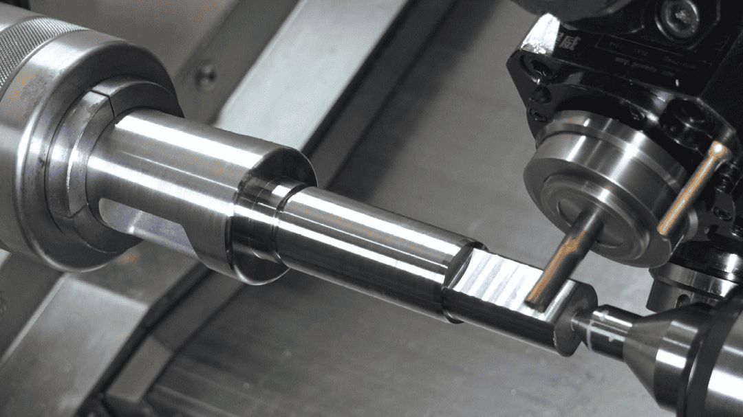 High-precision CNC machining process with metal workpiece on industrial lathe machine.