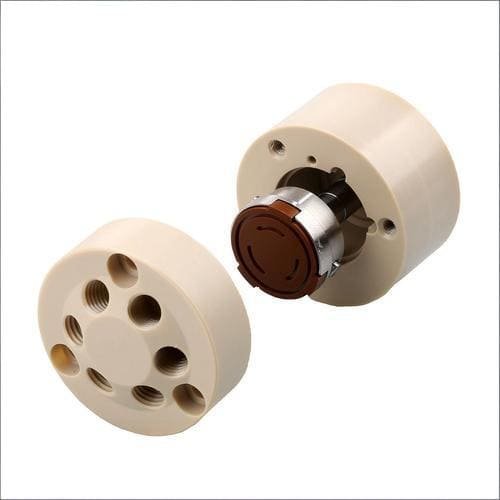 High-precision CNC machined plastic and metal component for industrial applications.