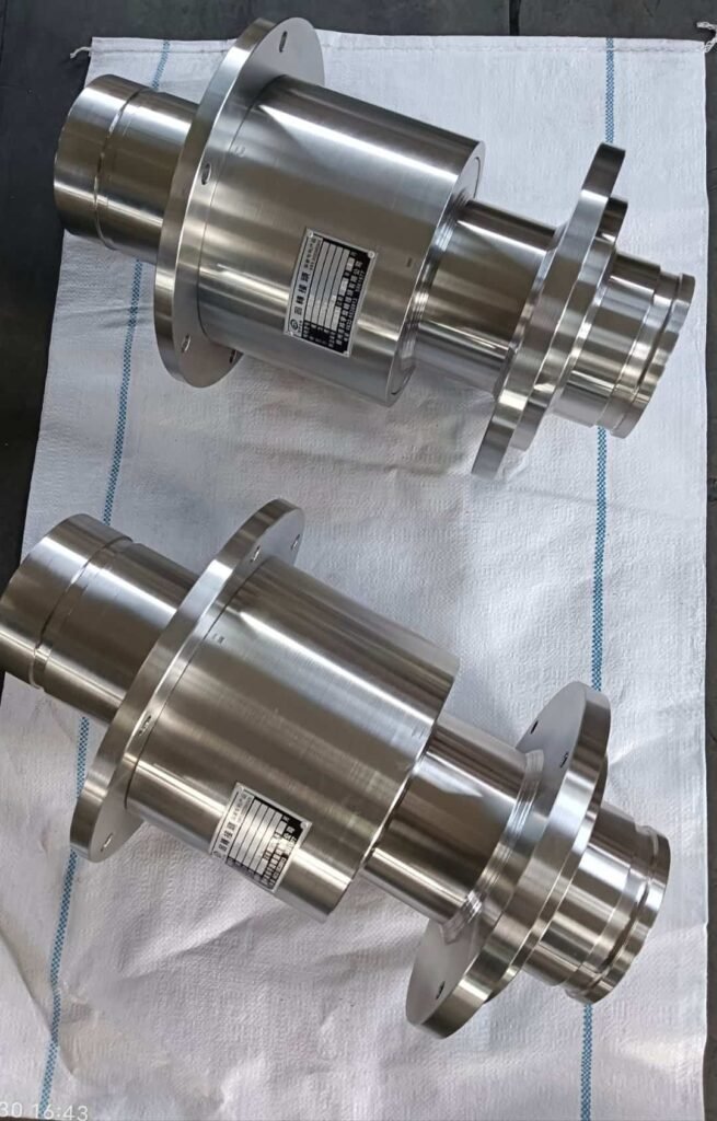 High-precision CNC machined metal components with flanges and labels.