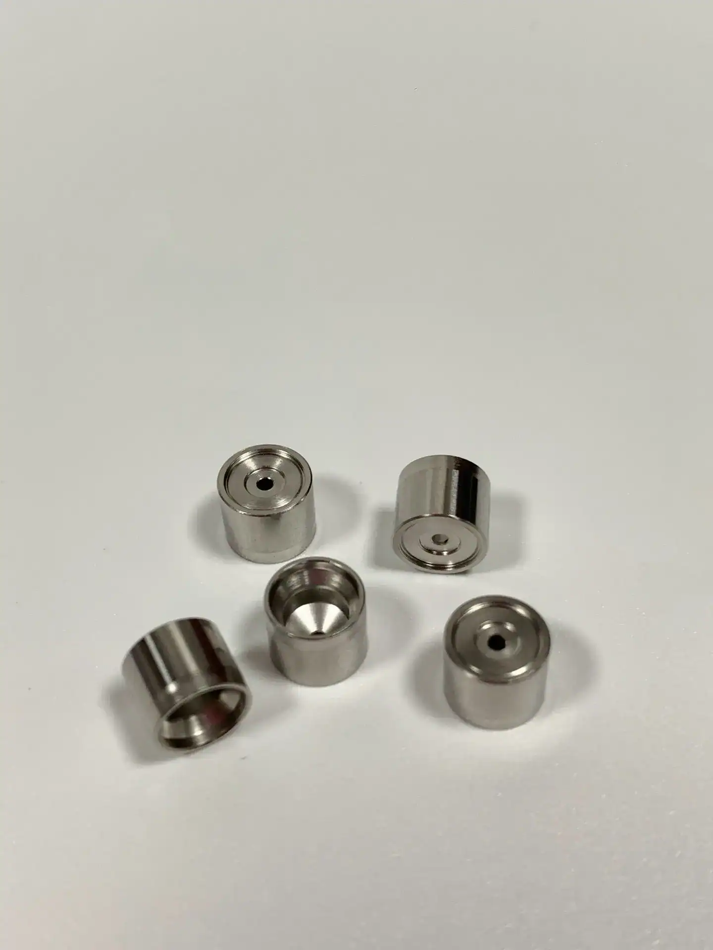 Miniature precision cup components