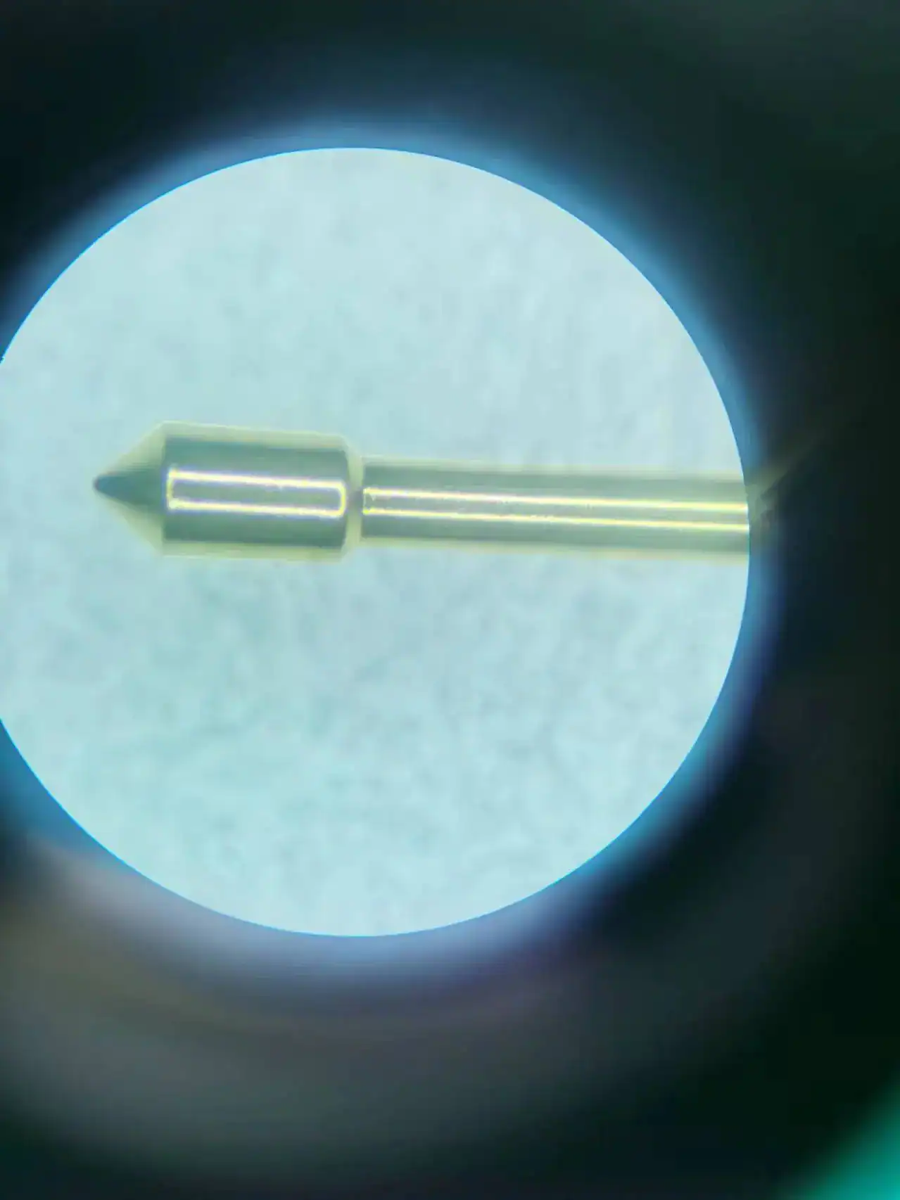 Micro pin viewed under magnification