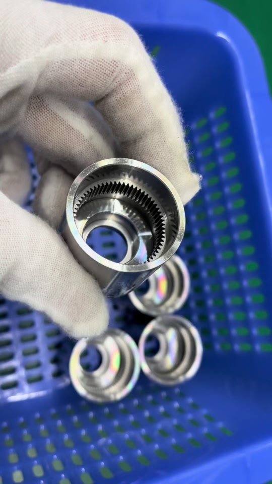 Close view of an internally splined metal sleeve