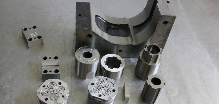 Copper electrodes and metal components used for cavity EDM work