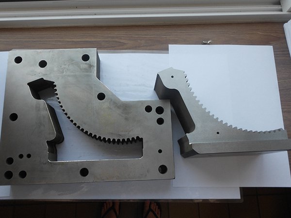 Metal tooling plates with intricate wire cut profiles